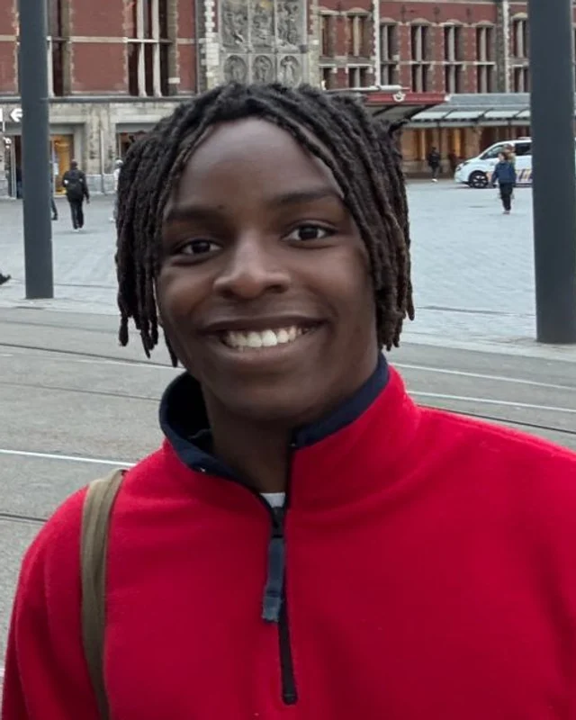 ND Nwaneri in front of Amsterdam Centraal